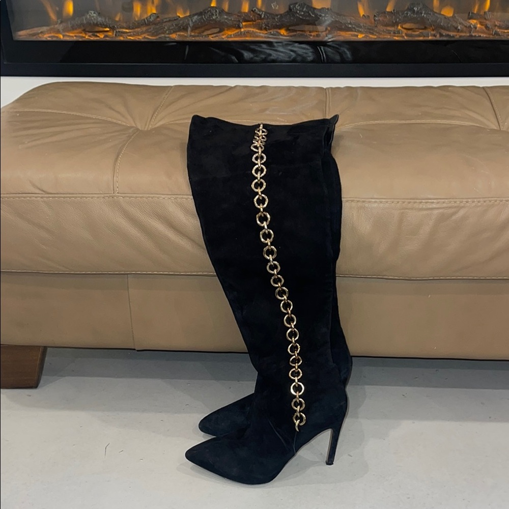 Elegant Black Knee-High Boots with Gold Chain Detail
